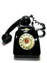 A vintage and antique telephone with white background.